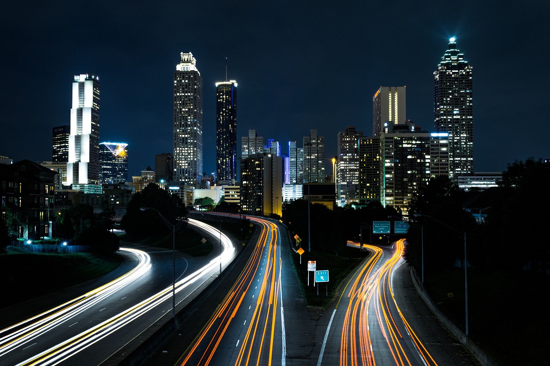 city at night with fast traffic lights.